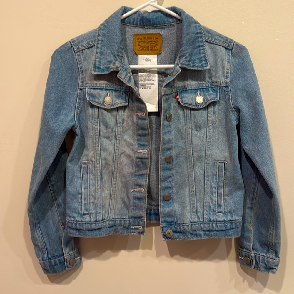 Never worn Levi’s denim jacket
